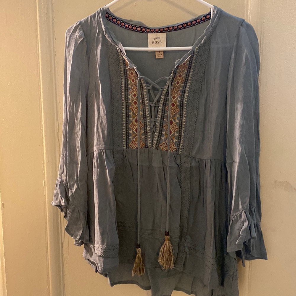 Blue top with cool design and ties in front